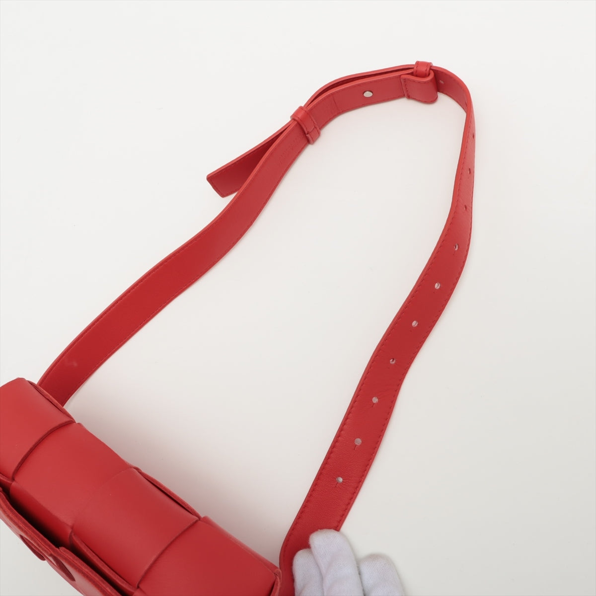 Bottega Veneta maxi intrecciato Cassette Leather Sling backpack Red