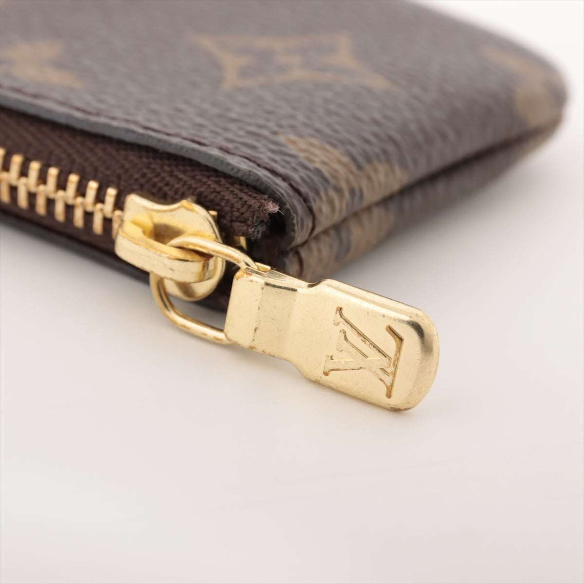 Louis Vuitton Monogram Pochette Cure M62650 Brown Coin case