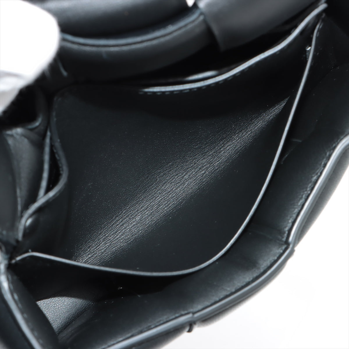 Bottega Veneta maxi intrecciato padette cassette Leather Sling backpack Black